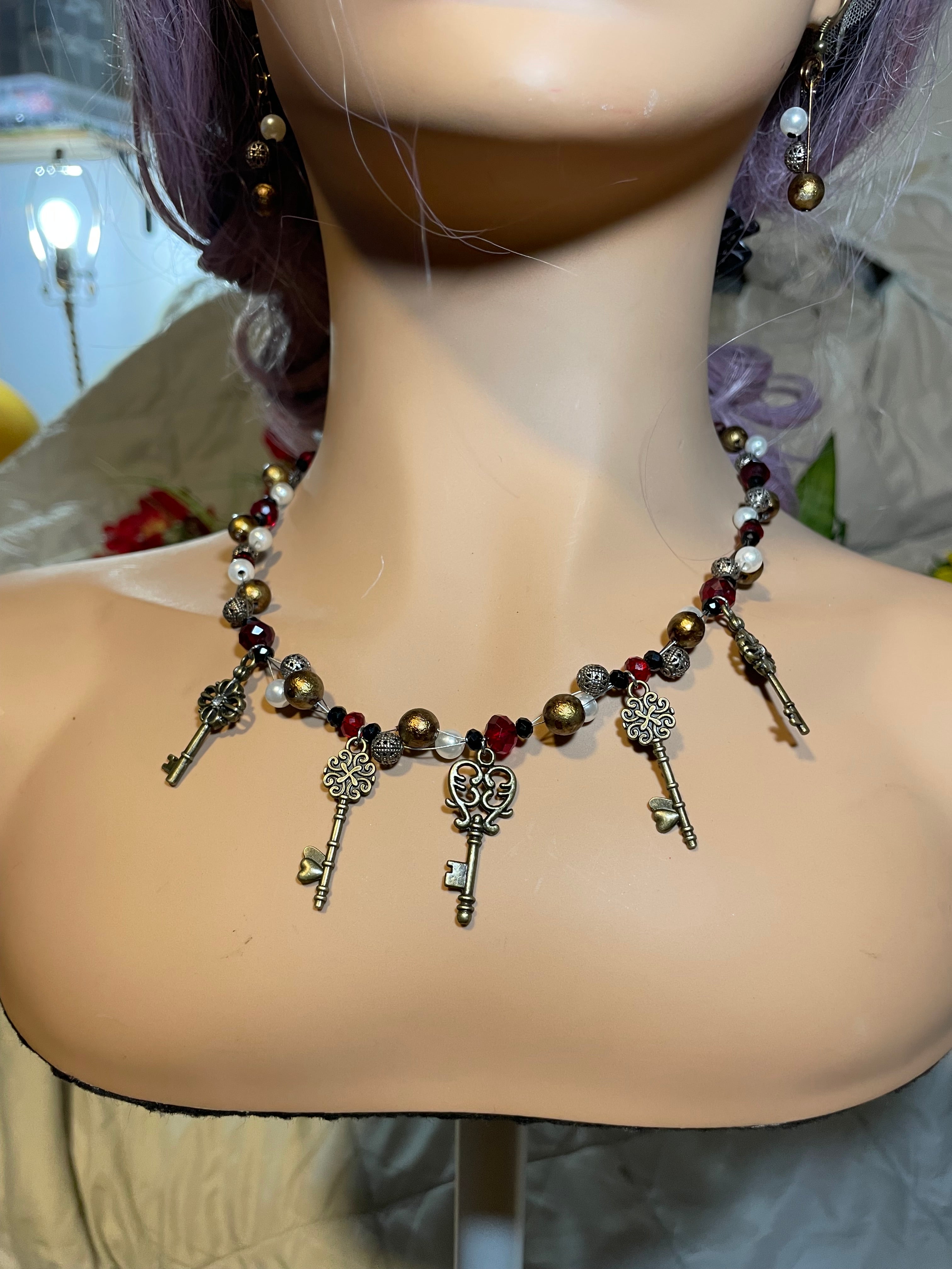 Necklace: Bronze Key Magic (earrings included)