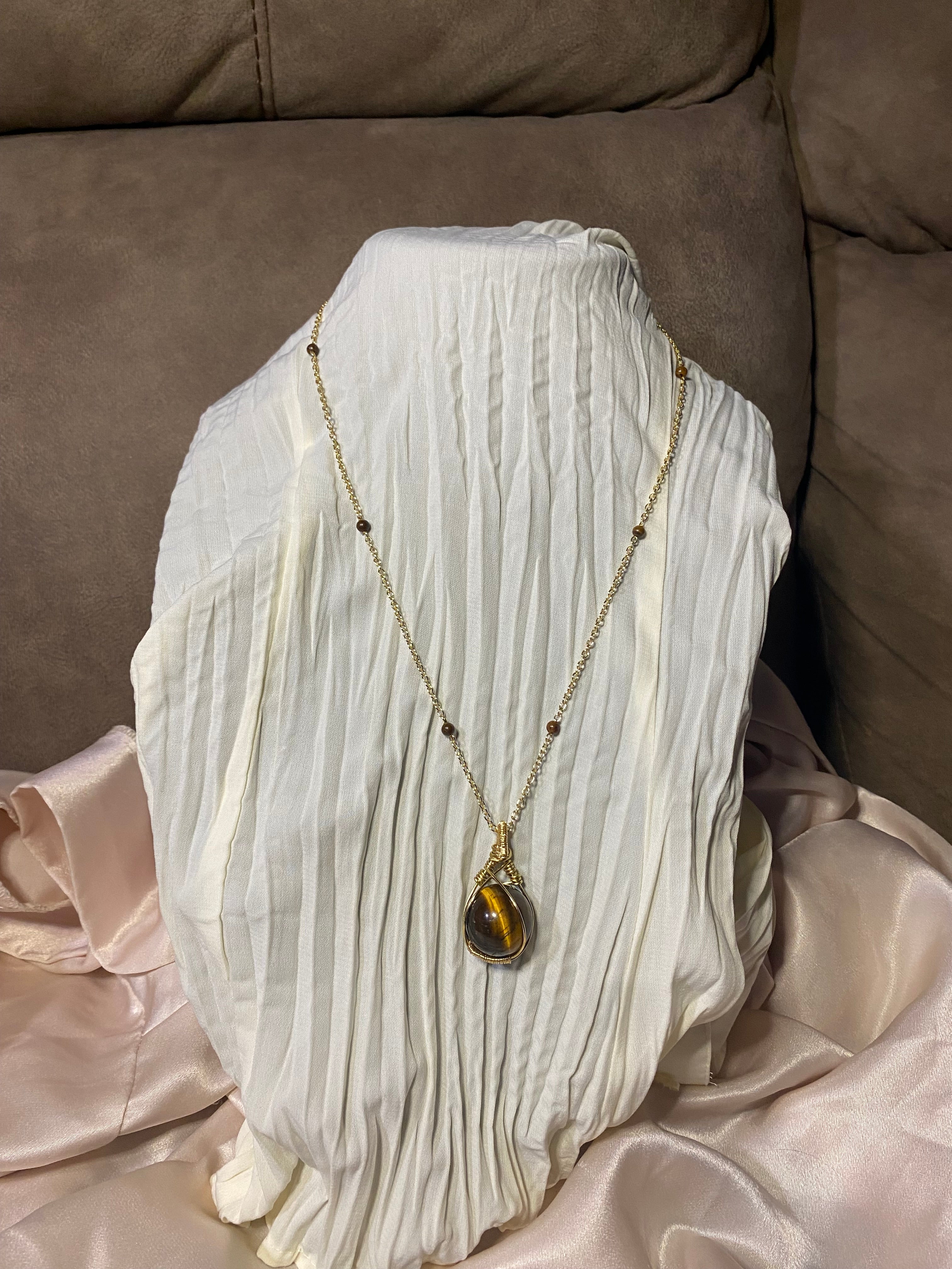 Wire wrapped tiger eye sphere