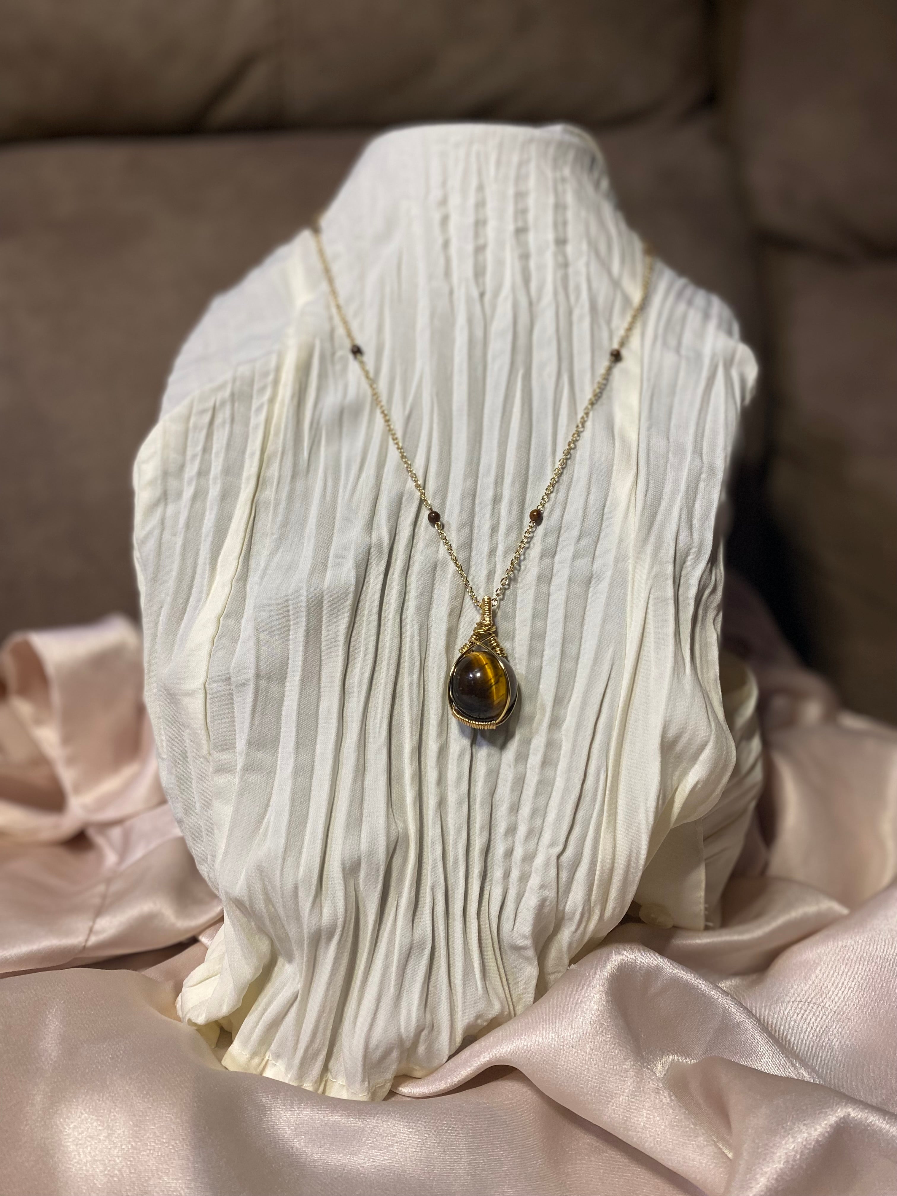 Wire wrapped tiger eye sphere