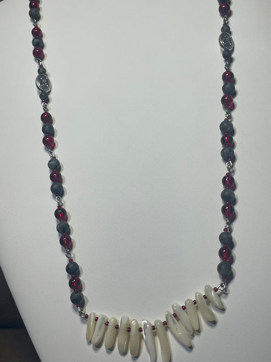 Tribal piece with mother pearl and laborite, hints of garnet