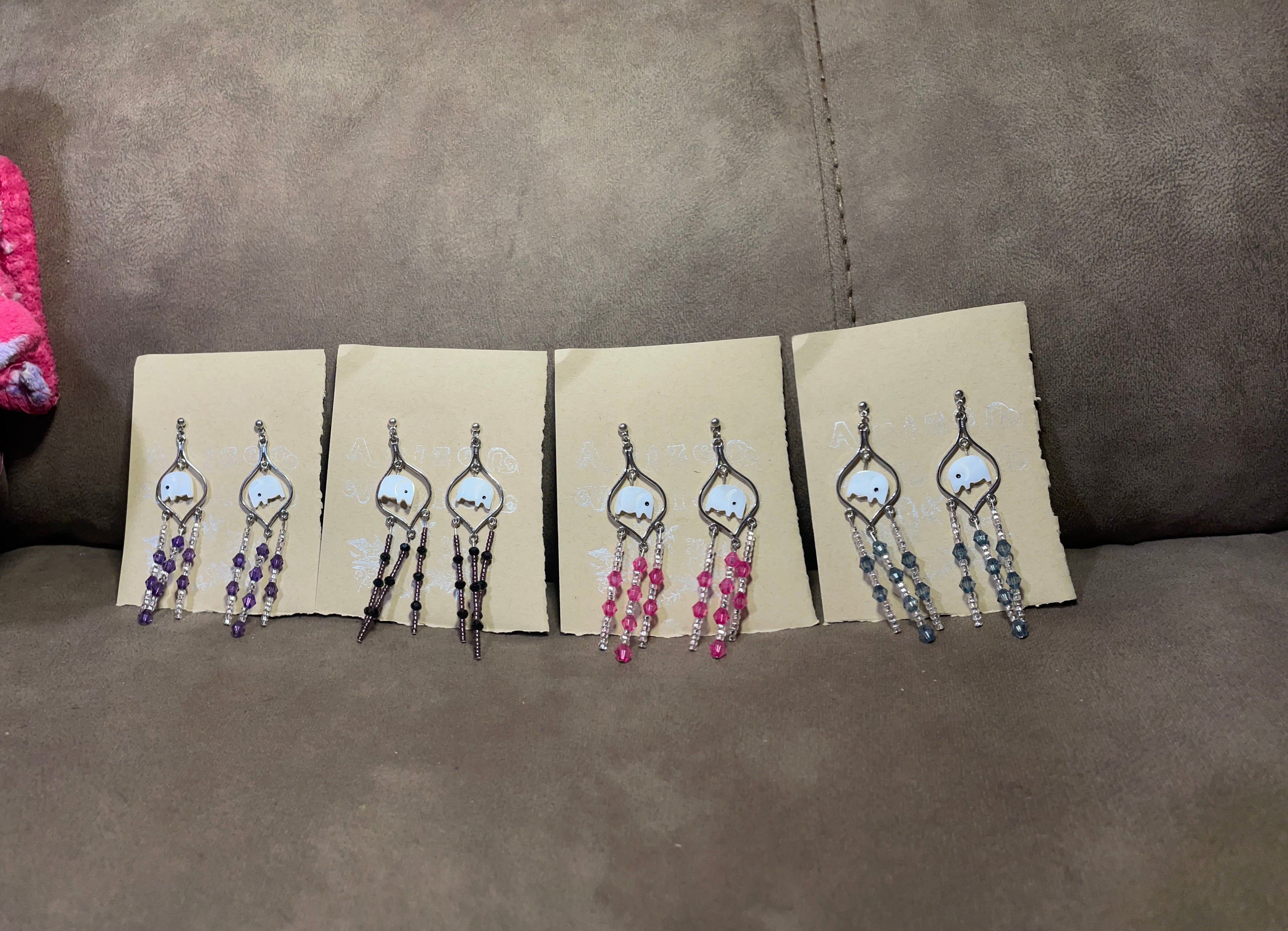 Ivory/Shell effect elephant dangles