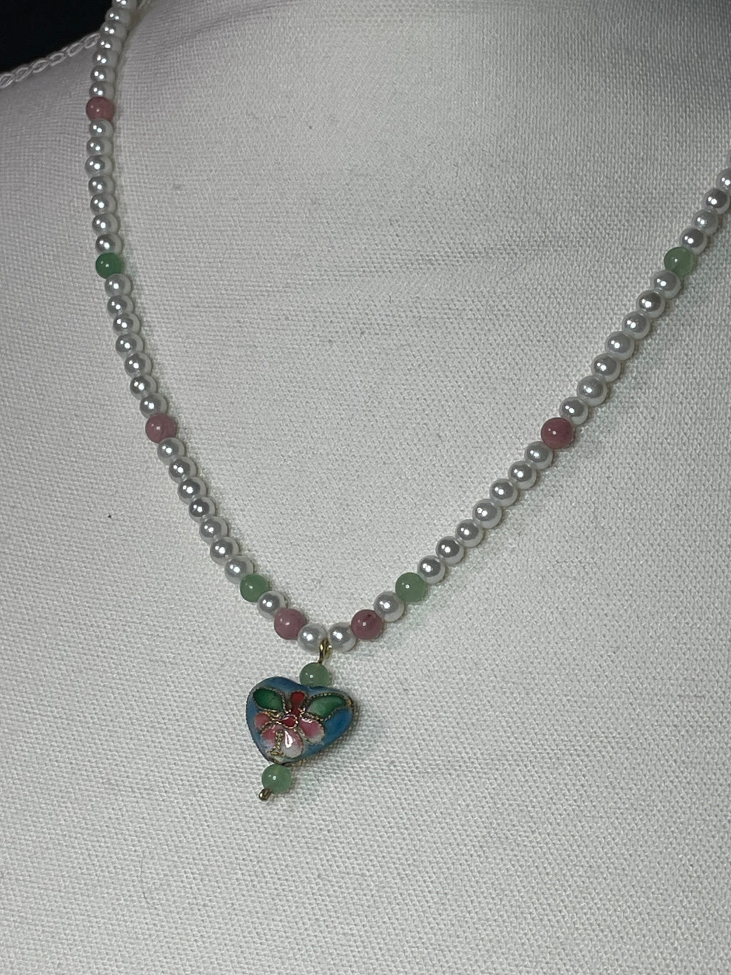 Aventurine, rhodonite, and glass pearls with heart shaped cloisonné dangle